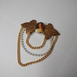 Large Gold Tone Chained Portrait Brooch